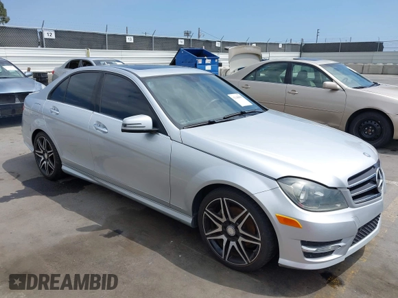 2014 Mercedes-Benz C-Class C 250 Sport with VIN WDDGF4HB0EG216428, listed as a IAAI auction lot 42148809 with 132,113 mi miles. Bid and sale history available at carsss.com. Image 1.