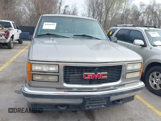 1998 GMC Suburban z VIN 3GKFK16R1WG510379, wystawiony jako IAAI lot #41859604 z przebiegiem 300 493 mil mil oraz . Historia ofert i sprzedaży dostępna na DreamBid. Obrazek 6.