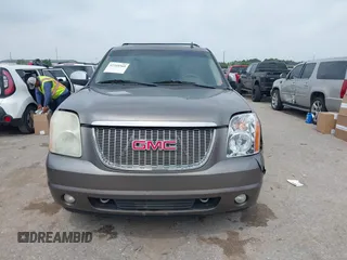 2011 GMC Yukon XL SLT z VIN 1GKS1KE07BR183572, wystawiony jako IAAI lot #42310565 z przebiegiem 341 982 mil mil oraz . Historia ofert i sprzedaży dostępna na DreamBid. Obrazek 12.