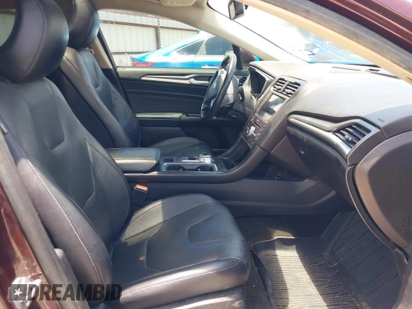 2018 Ford Fusion Titanium with VIN 3FA6P0K92JR114283, listed as a IAAI auction lot 42704476 with 92,502 mi miles and . Bid and sale history available at DreamBid. Image 5.