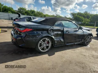 2023 BMW 4 Series 430i with VIN WBA23AT02PCL61138, listed as a Copart auction lot 67364435 with 18,698 mi miles and Salvage title. Bid and sale history available at DreamBid. Image 3.