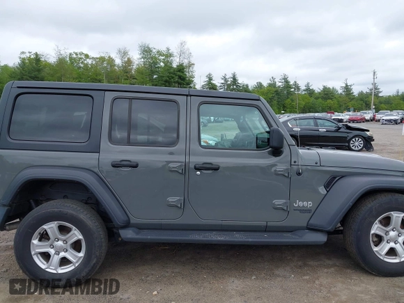 2020 Jeep Wrangler Unlimited Black and Tan with VIN 1C4HJXDG5LW187222, listed as a IAAI auction lot 42238194 with 9,237 mi miles and . Bid and sale history available at DreamBid. Image 13.