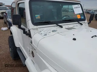 2001 Jeep Wrangler Sahara with VIN 1J4FA59S71P365271, listed as a IAAI auction lot 41889948 with 144,357 mi miles. Bid and sale history available at carsss.com. Image 6.