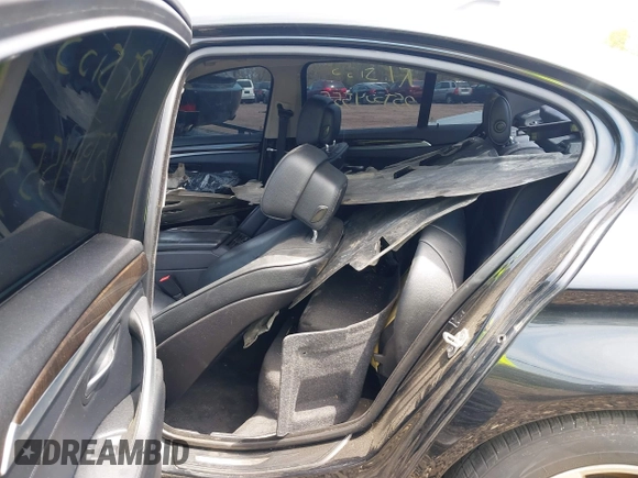2013 BMW 5 Series 528i xDrive with VIN WBAXH5C55DDW15974, listed as a IAAI auction lot 42185094 with Not provided miles and . Bid and sale history available at DreamBid. Image 8.