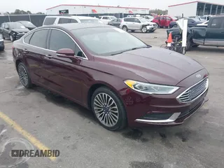 2018 Ford Fusion SE z VIN 3FA6P0HD7JR144018, wystawiony jako IAAI lot #41374486 z przebiegiem 86 494 mil mil oraz . Historia ofert i sprzedaży dostępna na DreamBid. Obrazek 1.
