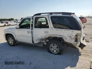 2003 Chevrolet Tahoe Z71 with VIN 1GNEK13Z23R205780, listed as a Copart auction lot 71045034 with 294,759 mi miles and Salvage Title. Bid and sale history available at carsss.com. Image 2.