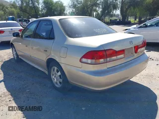 2001 Honda Accord EX z VIN JHMCG66801C014214, wystawiony jako IAAI lot #41643404 z przebiegiem 139 020 mil mil oraz . Historia ofert i sprzedaży dostępna na DreamBid. Obrazek 3.