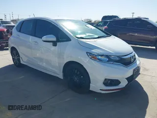 2018 Honda Fit Sport z VIN 3HGGK5H62JM732645, wystawiony jako IAAI lot #41216302 z przebiegiem 107 128 mil mil oraz . Historia ofert i sprzedaży dostępna na DreamBid. Obrazek 1.