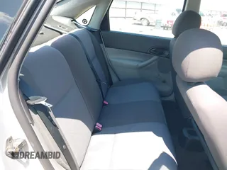 2007 Ford Focus S z VIN 1FAFP34N57W109953, wystawiony jako IAAI lot #42225399 z przebiegiem Nie podano mil oraz . Historia ofert i sprzedaży dostępna na DreamBid. Obrazek 8.