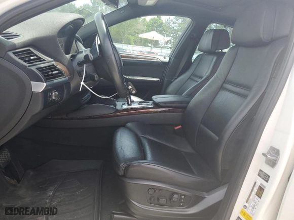 2014 BMW X6 xDrive35i with VIN 5UXFG2C53E0C44534, listed as a Copart auction lot 56518074 with 141,924 mi miles and Salvage Title. Bid and sale history available at carsss.com. Image 7.