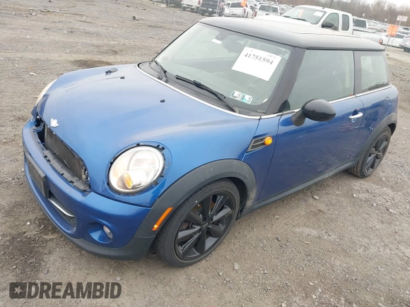 2013 MINI Hardtop with VIN WMWSU3C54DT375008, listed as a IAAI auction lot 41751594 with 136,269 mi miles and . Bid and sale history available at DreamBid. Image 2.