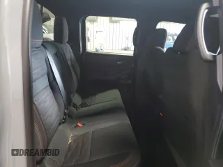 2022 Nissan Frontier Pro-4X z VIN 1N6ED1EK4NN674895, wystawiony jako Copart lot #54838395 z przebiegiem 44 867 mil mil oraz Szkoda całkowita • Salvage title. Historia ofert i sprzedaży dostępna na DreamBid. Obrazek 10.