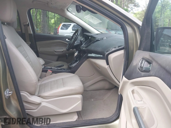 2014 Ford Escape Titanium with VIN 1FMCU9JX9EUB23972, listed as a IAAI auction lot 42217298 with 164,556 mi miles and . Bid and sale history available at DreamBid. Image 5.