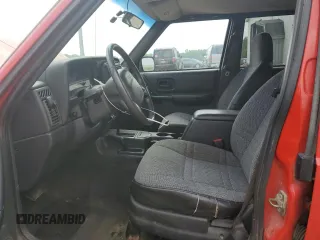 1999 Jeep Cherokee Sport with VIN 1J4FF68S4XL580048, listed as a Copart auction lot 62546365 with 154,059 mi miles and Clean title. Bid and sale history available at DreamBid. Image 7.