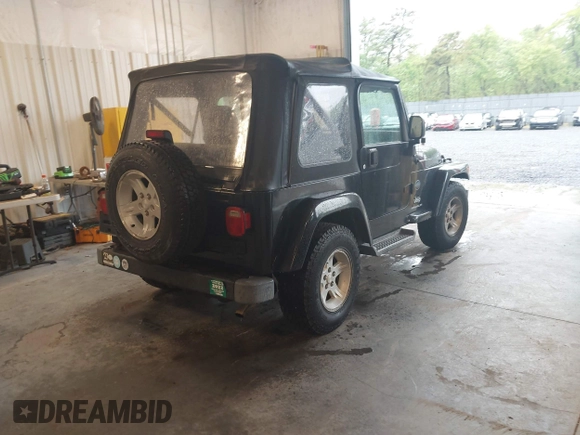 2005 Jeep Wrangler X with VIN 1J4FA39S95P356033, listed as a IAAI auction lot 42252776 with 40,512 mi miles and . Bid and sale history available at DreamBid. Image 4.