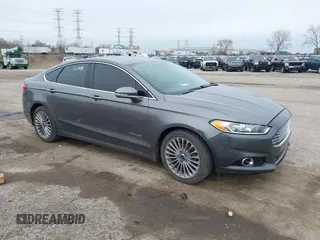 2013 Ford Fusion Titanium Hybrid with VIN 3FA6P0RU5DR289612, listed as a IAAI auction lot 41903288 with 168,661 mi miles. Bid and sale history available at carsss.com. Image 1.