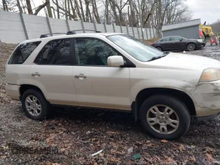2004 Acura MDX Touring Pkg RES w/Nav with VIN 2HNYD18974H549920, listed as a IAAI auction lot 41696166 with 264,868 mi miles. Bid and sale history available at carsss.com. Image 13.