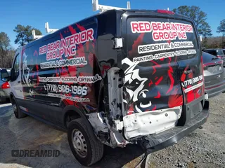 2022 Ford Transit Cargo with VIN 1FTBR2Y84NKA64395, listed as a IAAI auction lot 41359067 with 59,393 mi miles and . Bid and sale history available at DreamBid. Image 3.