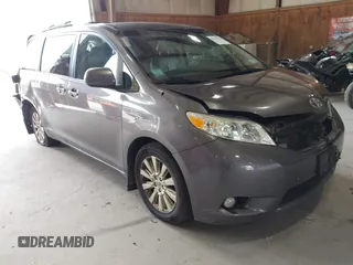 2014 Toyota Sienna Limited with VIN 5TDDK3DC7ES078040, listed as a IAAI auction lot 42771373 with 214,399 mi miles and . Bid and sale history available at DreamBid. Image 1.