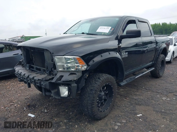 2014 Ram 1500 Express z VIN 1C6RR7KT9ES162080, wystawiony jako IAAI lot #42236759 z przebiegiem 147 216 mil mil oraz . Historia ofert i sprzedaży dostępna na DreamBid. Obrazek 21.
