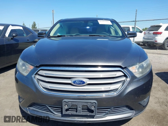 2015 Ford Taurus SEL z VIN 1FAHP2E83FG184588, wystawiony jako IAAI lot #42262166 z przebiegiem 116 392 mil mil oraz . Historia ofert i sprzedaży dostępna na DreamBid. Obrazek 12.