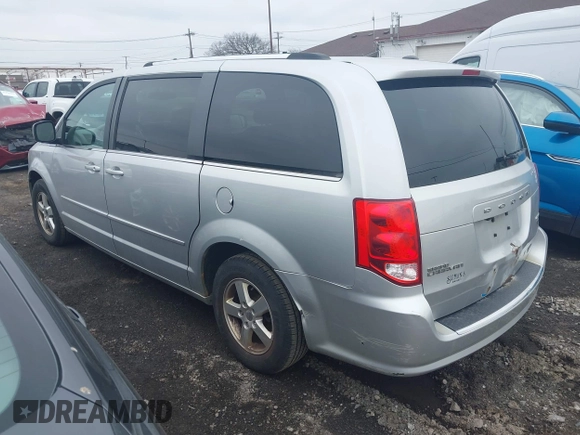 2011 Dodge Grand Caravan Crew with VIN 2D4RN5DGXBR678747, listed as a IAAI auction lot 41899883 with 196,100 mi miles and . Bid and sale history available at DreamBid. Image 3.