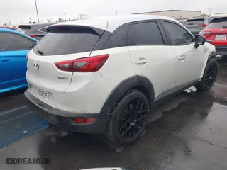 2017 Mazda CX-3 Sport with VIN JM1DKDB72H0167324, listed as a IAAI auction lot 41910027 with 81,110 mi miles. Bid and sale history available at carsss.com. Image 4.