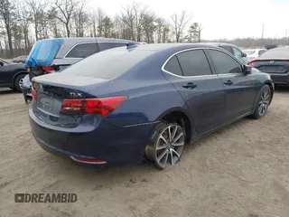 2015 Acura TLX V6 Tech with VIN 19UUB2F51FA020482, listed as a IAAI auction lot 41659296 with 71,434 mi miles. Bid and sale history available at carsss.com. Image 4.