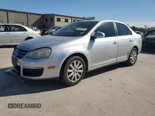 2009 Volkswagen Jetta S z VIN 3VWJM71K79M167562, wystawiony jako Copart lot #80546594 z przebiegiem 196 891 mil mil oraz Szkoda całkowita • Salvage title. Historia ofert i sprzedaży dostępna na DreamBid. Obrazek 1.