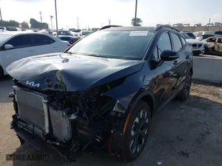 2023 Kia Sportage Plug-In Hybrid X-Line with VIN KNDPYDAH9P7027170, listed as a IAAI auction lot 41583963 with 15,276 mi miles. Bid and sale history available at carsss.com. Image 2.