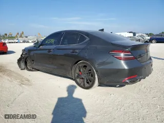 2022 Genesis G70 3.3T with VIN KMTG54TE1NU100317, listed as a Copart auction lot 71043572 with 23,779 mi miles. Bid and sale history available at carsss.com. Image 2.
