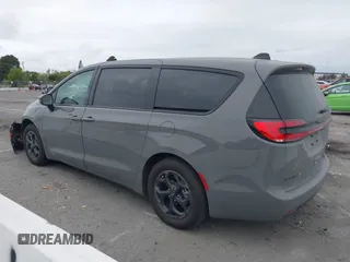 2023 Chrysler Pacifica Hybrid Touring L with VIN 2C4RC1L71PR584485, listed as a IAAI auction lot 42056423 with 58,955 mi miles and . Bid and sale history available at DreamBid. Image 15.