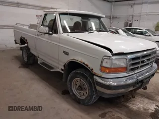 1996 Ford F-150 with VIN 1FTEF14H4TNA25002, listed as a IAAI auction lot 41604931 with 118,807 mi miles. Bid and sale history available at carsss.com. Image 1.