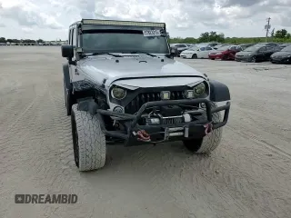 2012 Jeep Wrangler Unlimited Sport z VIN 1C4BJWDG8CL220960, wystawiony jako Copart lot #57823315 z przebiegiem 177 541 mil mil oraz Szkoda całkowita • Salvage title. Historia ofert i sprzedaży dostępna na DreamBid. Obrazek 15.