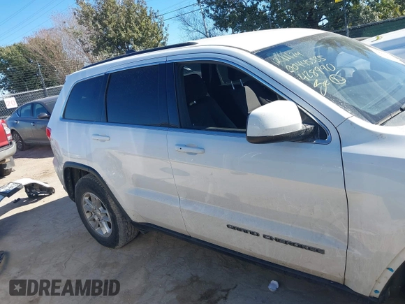 2018 Jeep Grand Cherokee Laredo E with VIN 1C4RJEAG2JC428990, listed as a IAAI auction lot 41218996 with 123,758 mi miles. Bid and sale history available at carsss.com. Image 14.