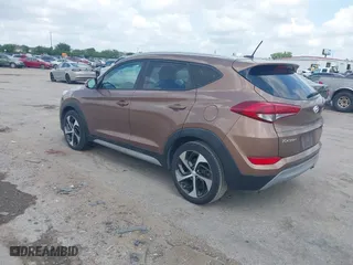 2017 Hyundai Tucson Value with VIN KM8J33A27HU430198, listed as a IAAI auction lot 42104369 with 163,929 mi miles. Bid and sale history available at carsss.com. Image 3.