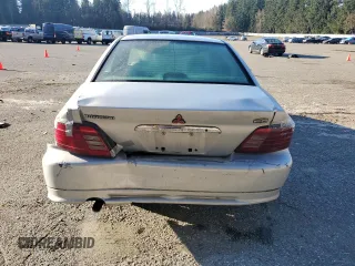 1999 Mitsubishi Galant ES with VIN 4A3AA46G0XE002483, listed as a Copart auction lot 47401435 with 212,154 mi miles and Salvage Title. Bid and sale history available at carsss.com. Image 6.
