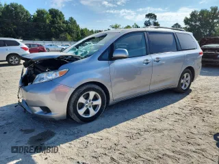 2011 Toyota Sienna LE AAS with VIN 5TDKK3DC8BS011725, listed as a Copart auction lot 64769995 with 276,830 mi miles and Salvage title. Bid and sale history available at DreamBid. Image 1.