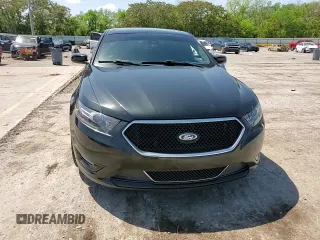 2013 Ford Taurus SHO z VIN 1FAHP2KT7DG133620, wystawiony jako Copart lot #54219005 z przebiegiem Nie podano mil oraz Szkoda całkowita • Salvage title. Historia ofert i sprzedaży dostępna na DreamBid. Obrazek 13.