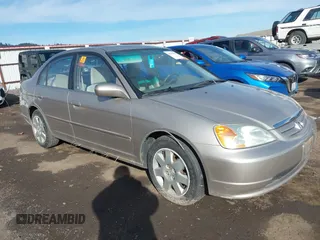 2001 Honda Civic EX with VIN 2HGES25771H573560, listed as a IAAI auction lot 41561405 with 201,475 mi miles. Bid and sale history available at carsss.com. Image 1.