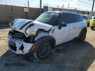 2013 MINI Paceman with VIN WMWSS1C51DWN94159, listed as a Copart auction lot 49740955 with 104,023 mi miles and Clean Title. Bid and sale history available at DreamBid. Image 1.