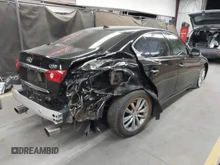 2014 Infiniti Q50 Premium with VIN JN1BV7AP6EM676289, listed as a IAAI auction lot 42304661 with 117,905 mi miles and . Bid and sale history available at DreamBid. Image 4.