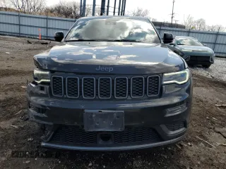 2018 Jeep Grand Cherokee High Altitude with VIN 1C4RJFCG6JC229685, listed as a Copart auction lot 50161555 with 151,176 mi miles and Salvage title. Bid and sale history available at DreamBid. Image 5.