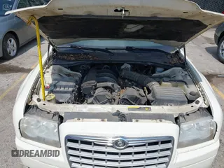 2006 Chrysler 300 with VIN 2C3LA43R16H250237, listed as a IAAI auction lot 42002745 with 157,911 mi miles. Bid and sale history available at carsss.com. Image 10.