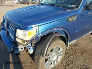 2010 Dodge Nitro Heat z VIN 1D4PU4GK1AW157684, wystawiony jako IAAI lot #41767719 z przebiegiem 140 260 mil mil oraz . Historia ofert i sprzedaży dostępna na DreamBid. Obrazek 6.