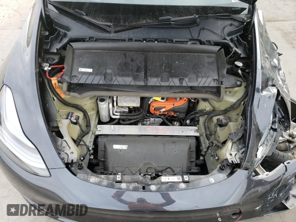 2024 Tesla Model Y Long Range with VIN 7SAYGAEE5RF038446, listed as a Copart auction lot 48868025 with 10,410 mi miles and Salvage Title. Bid and sale history available at DreamBid. Image 13.