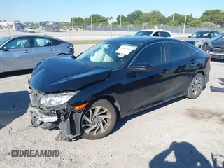 2018 Honda Civic EX with VIN 2HGFC2F79JH549826, listed as a IAAI auction lot 41697583 with 71,384 mi miles and . Bid and sale history available at DreamBid. Image 2.