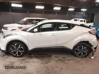 2019 Toyota C-HR XLE z VIN NMTKHMBX5KR073091, wystawiony jako IAAI lot #42190807 z przebiegiem 41 654 mil mil oraz . Historia ofert i sprzedaży dostępna na DreamBid. Obrazek 14.