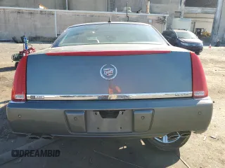 2006 Cadillac DTS 1SC z VIN 1G6KD57Y76U237062, wystawiony jako Copart lot #70920534 z przebiegiem 84 589 mil mil oraz Szkoda całkowita • Salvage title. Historia ofert i sprzedaży dostępna na DreamBid. Obrazek 6.