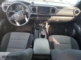 2021 Toyota Tacoma 4WD SR5 with VIN 3TMDZ5BN6MM112690, listed as a Copart auction lot 47038895 with 99,860 mi miles and Salvage Title. Bid and sale history available at carsss.com. Image 8.